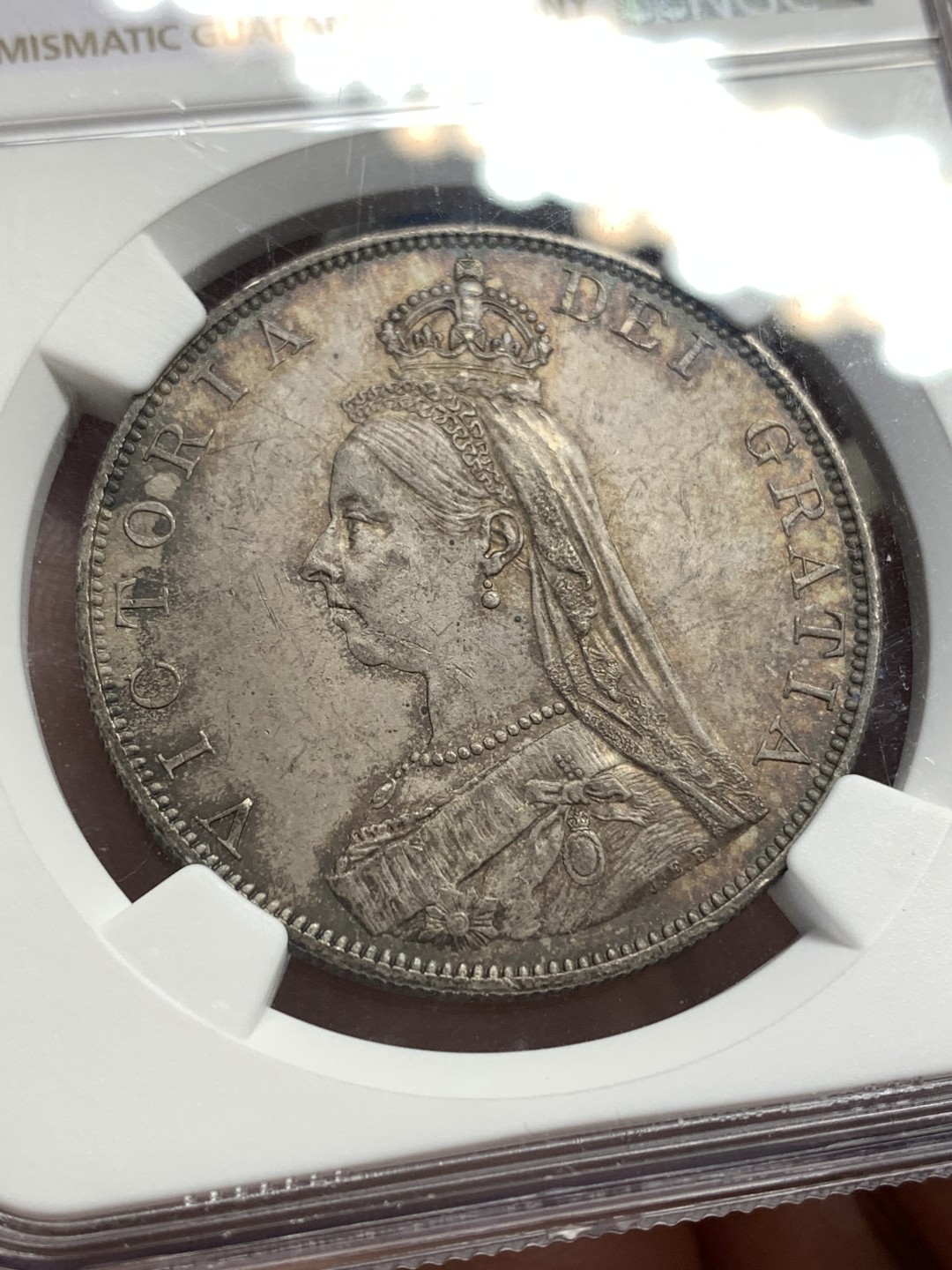 《竞宝斋》第169场-周日，周一2场 (全场包邮) NGC-MS63 英国1887年老维高冠双弗洛林大银币 包浆醇厚美丽 罗马1版本少见