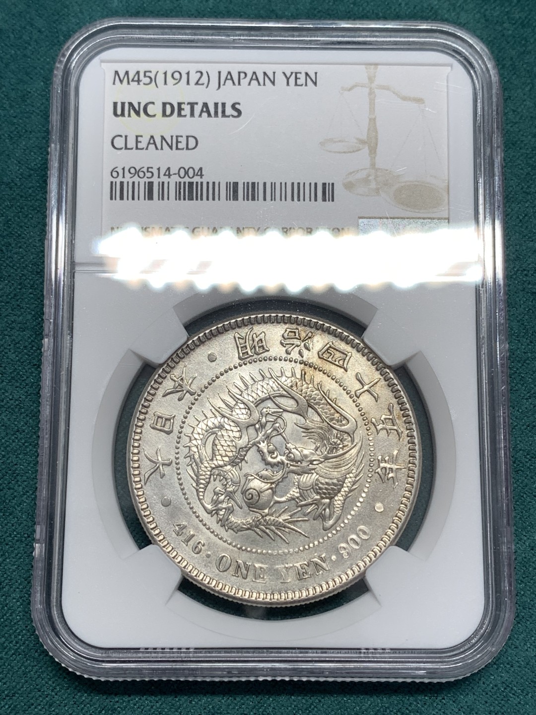 《竞宝斋》第169场-周日，周一2场 (全场包邮) NGC-UNC 日本 明治45年 日本龙洋一元 轻微清洗痕迹 压印清晰，带底光