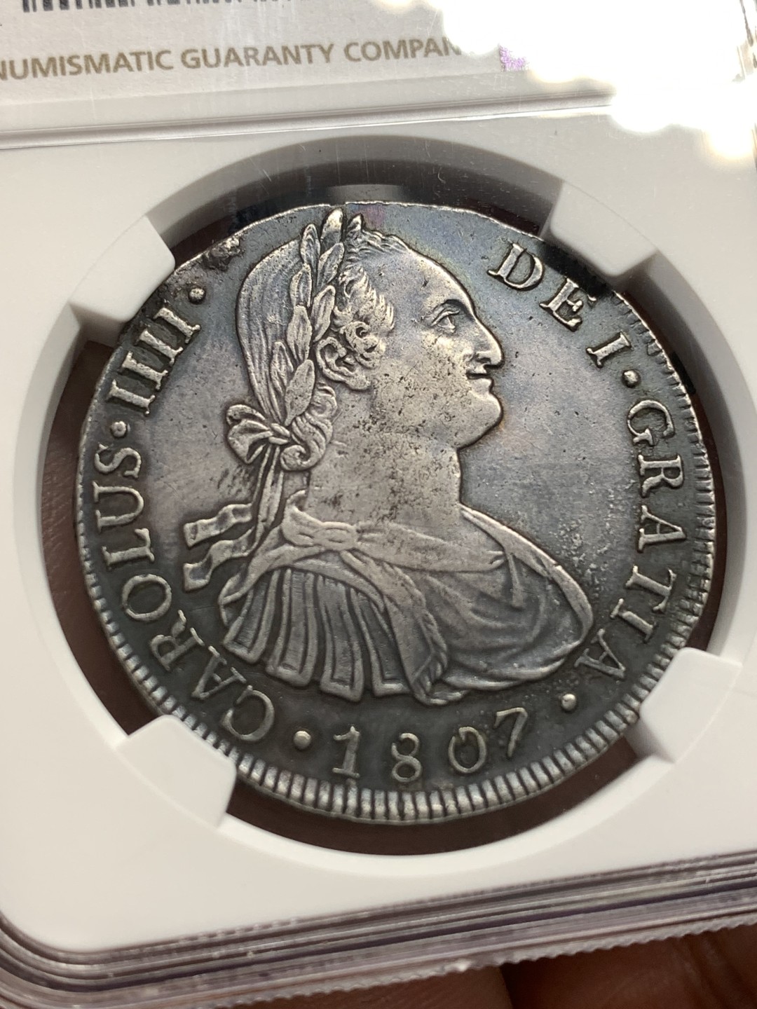 《竞宝斋》第169场-周日，周一2场 (全场包邮) NGC-AUD 秘鲁 1807年卡洛斯四世双柱银币 双面深打 细节很好