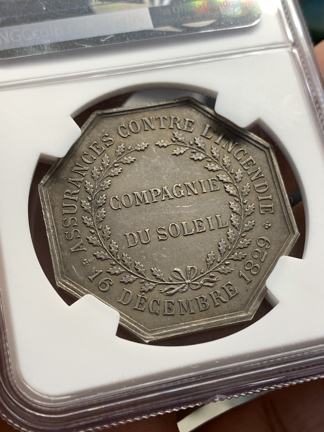 《竞宝斋》第169场-周日，周一2场 (全场包邮) NGC-MS61 法国 1829 太阳保险八角银质代币