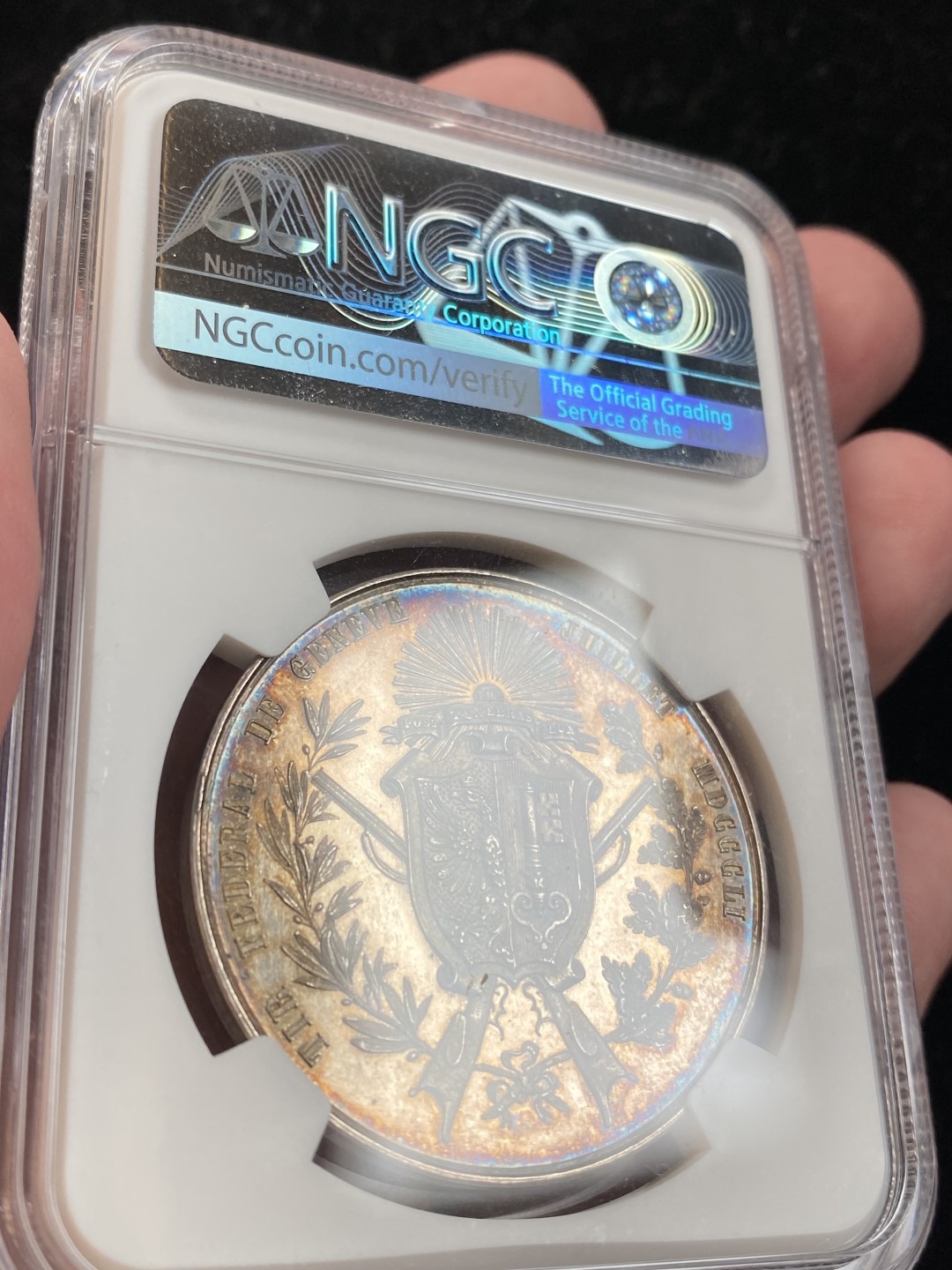 万国钱币拍卖第009期（万国白金之夜） NGC MS63 1851瑞士日内瓦射击节女神银章，原味五彩，镜面底板。