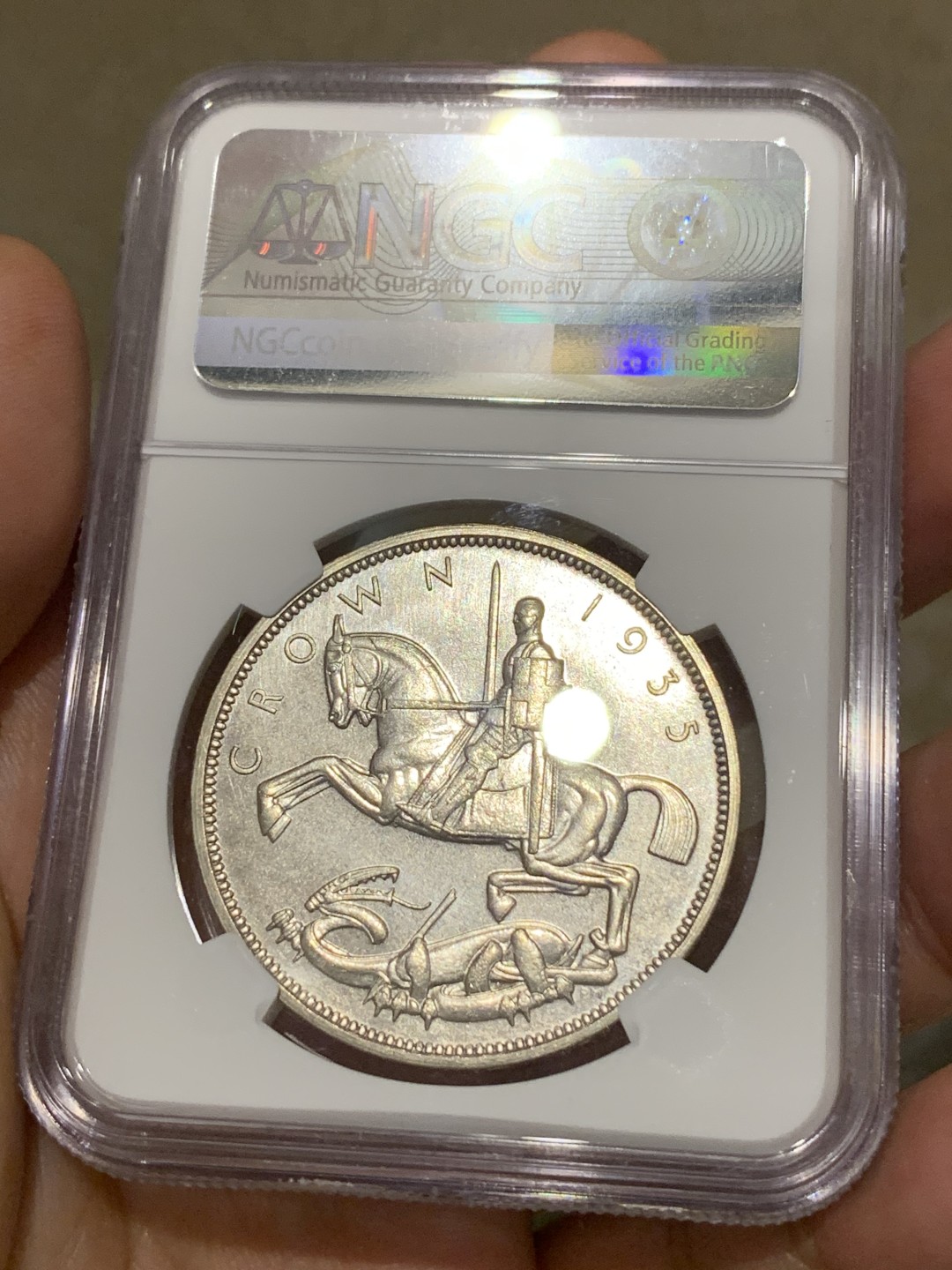 《竞宝斋》第169场-周日，周一2场 (全场包邮) NGC SP64 英国1935年乔治五世马剑一克朗银币，SP特制版本 NGC极少标注SP