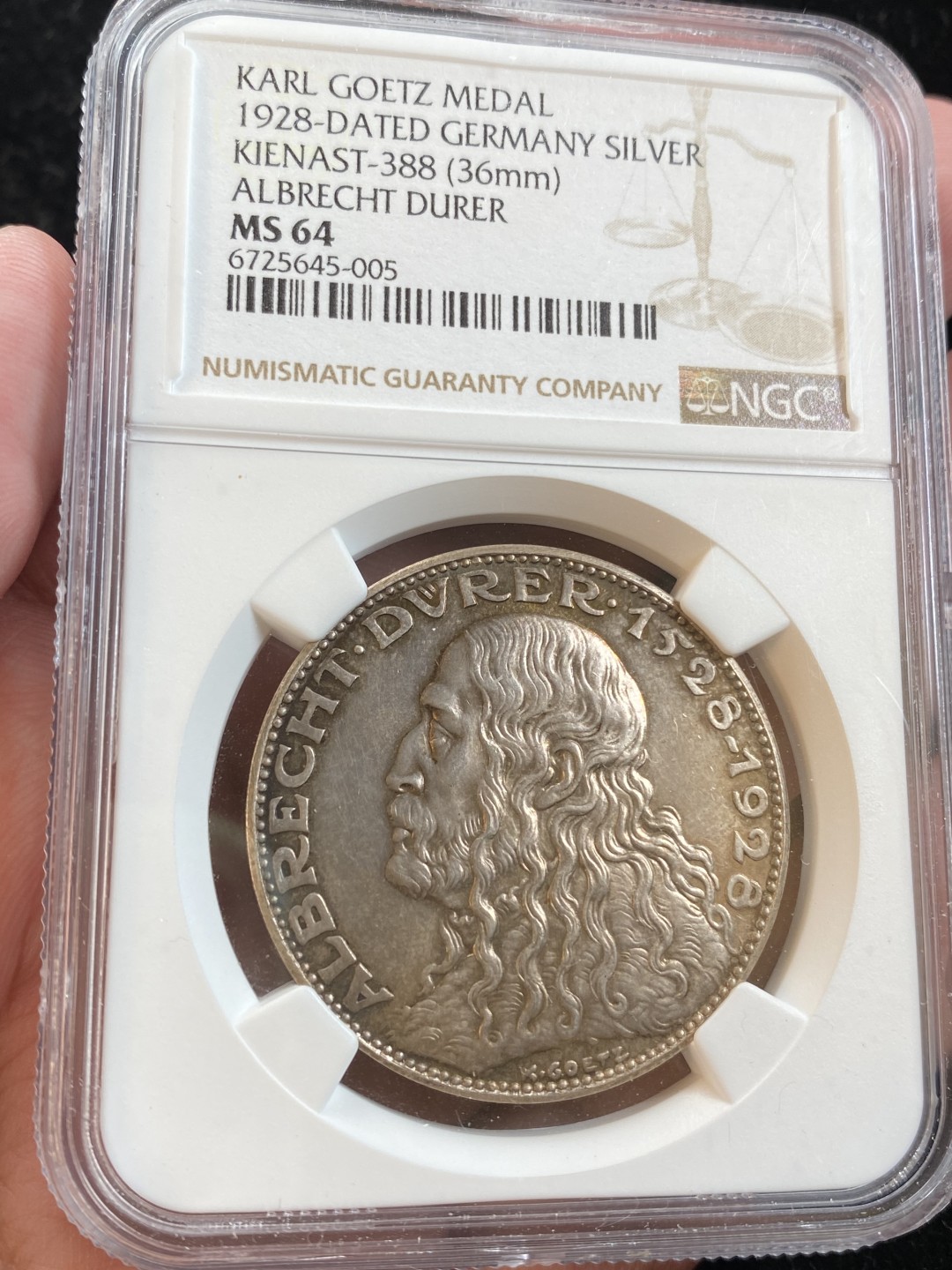 万国钱币拍卖第009期（万国白金之夜） NGC MS64 1928德国画家丢勒银章，卡尔哥茨设计，好品好状态。