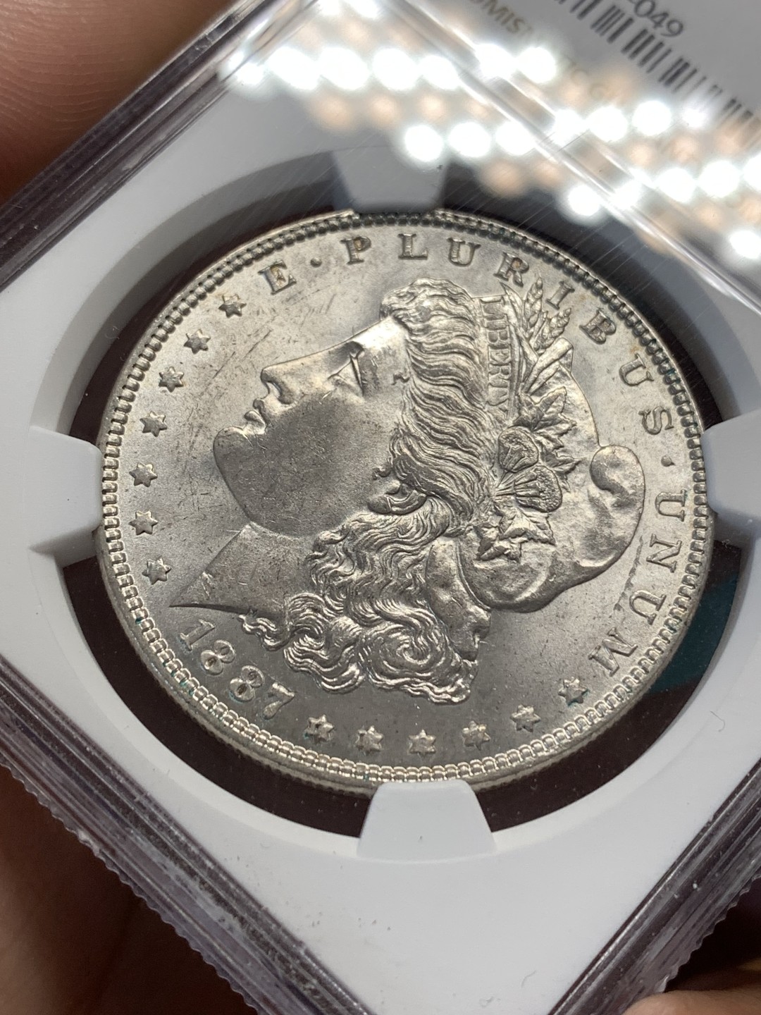 《竞宝斋》第169场-周日，周一2场 (全场包邮) NGC-MS63 美国1887年 摩根一元 原光好品