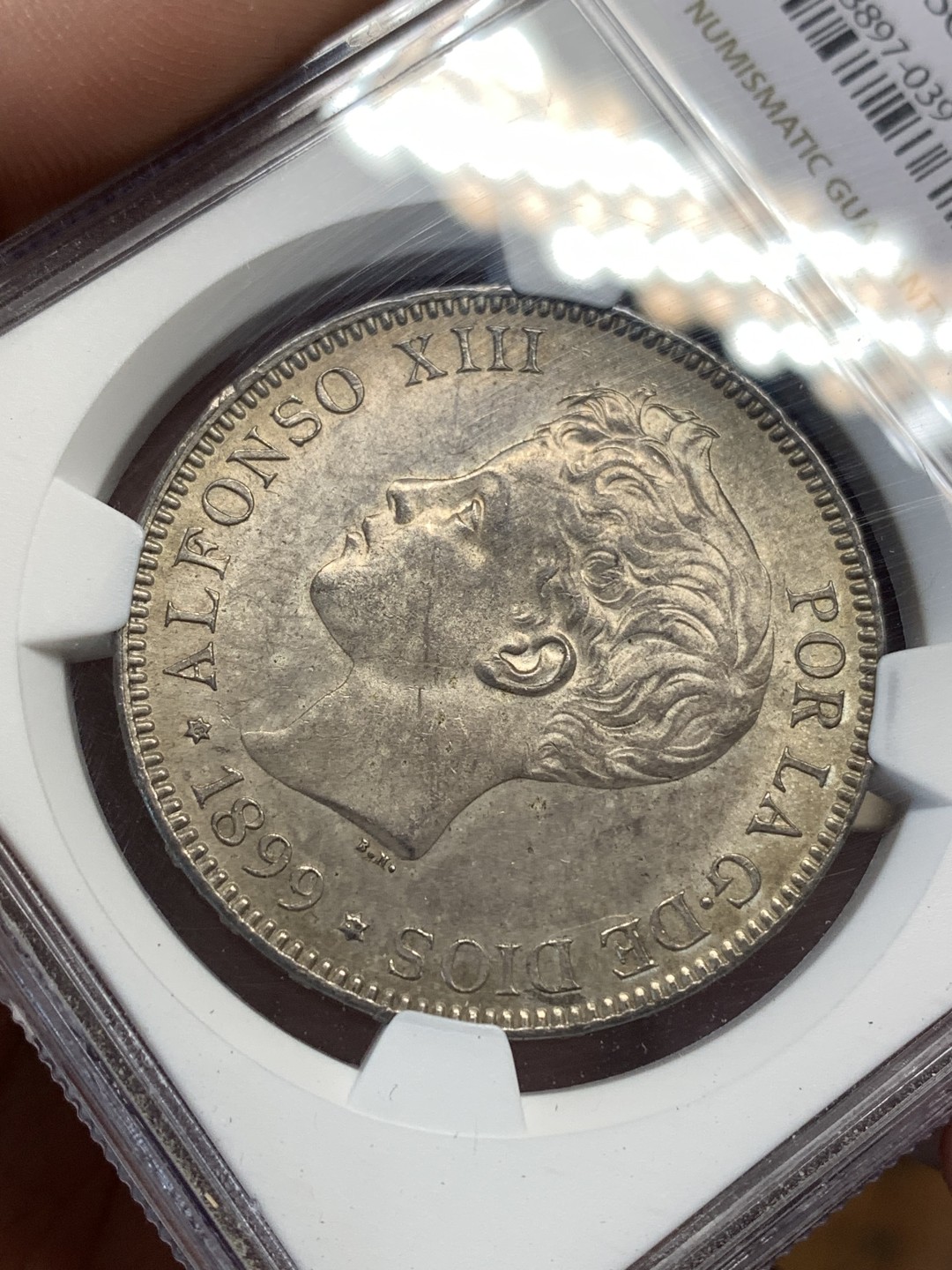 《竞宝斋》第169场-周日，周一2场 (全场包邮) NGC-UNC 西班牙1899年 阿方索十三世 5比塞塔双柱银币 顶级原光好品 可以重评