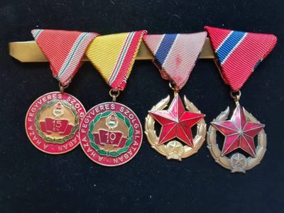 盛世勋华——号角文化勋章邮票模型专场拍卖第110期 - 匈牙利（社会主义）四联联挂 包括：长期服役奖章10年.15年各一枚 金级公安服务奖章和铜级公安服务奖章