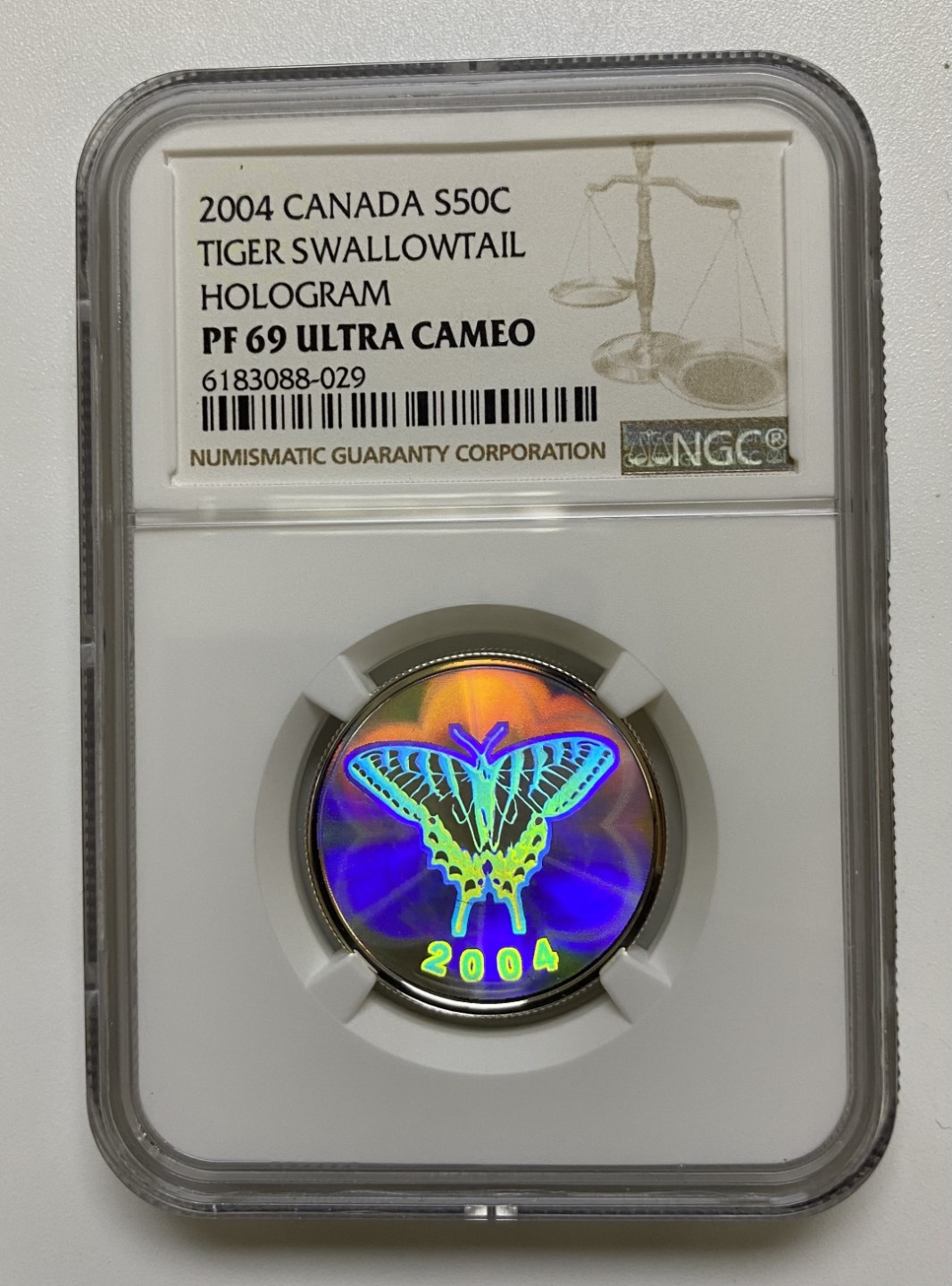 【金钰满堂钱币】拍卖第一期 希望大家多多捧场 2004年加拿大幻彩蝴蝶精制银币评级NGC69分