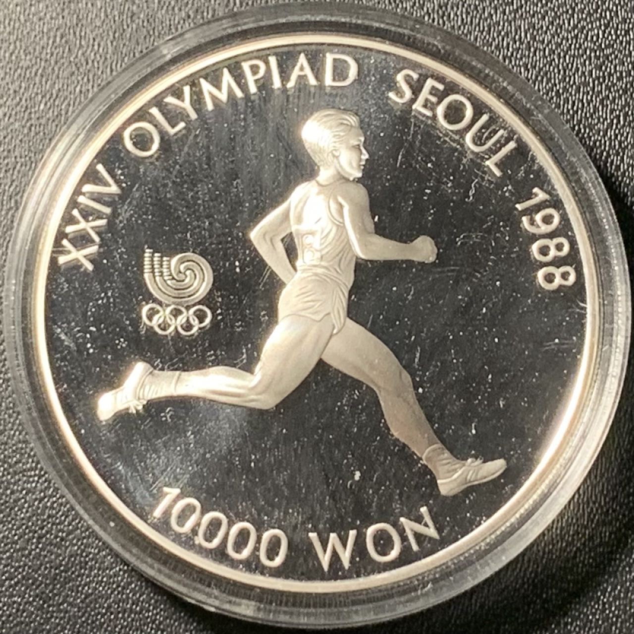 紫瑗钱币——第317期拍卖 韩国 1986年 汉城奥运会 长跑 10000韩元 33.62克 0.925银 精制