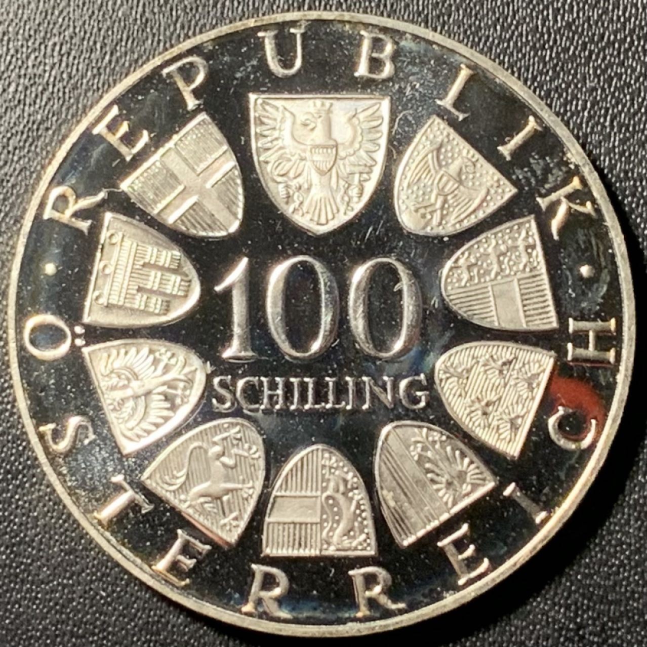 紫瑗钱币——第317期拍卖 奥地利 1976年 因斯布鲁克冬奥运 主会场 100先令 24克 0.64银 精制