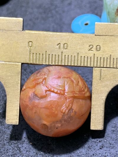 精美亚光冰飘战国红玛瑙手工俏色巧雕西出东土，一心向佛意境珠一颗！ 精美亚光冰飘战国红玛瑙手工俏色巧雕西出东土，一心向佛意境珠一颗！