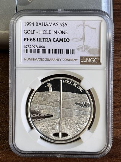 【海寕潮】拍卖第七十一期 - 【海寧潮A】获奖币巴哈马1994年一杆进洞镂空精制1盎司纪念银币NGC-PF68,999银，获得克劳斯1996年度最佳创意币大奖