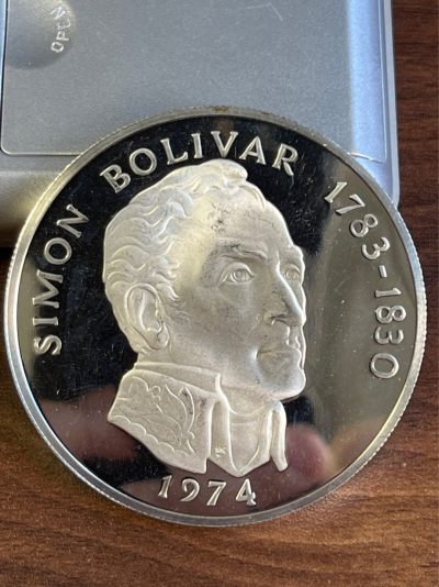 【海寕潮】拍卖第七十一期 - 【海寕潮】巴拿马1974年西蒙玻利瓦尔130克精制纪念银币现在银价5.47每克！有瑕疵