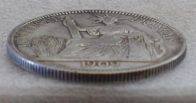 世界钱币章牌书籍专场拍卖11.01 1909年 座洋一元大银币