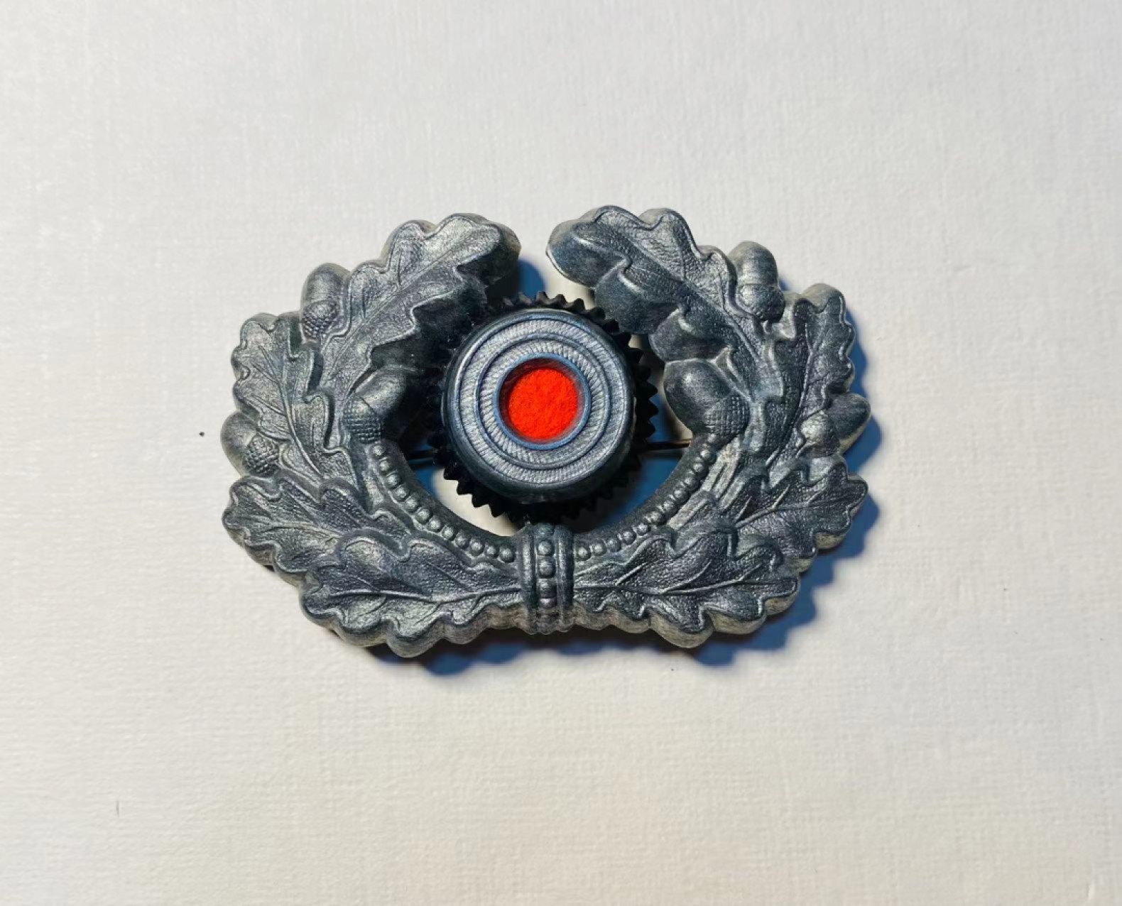 阿娜斯塔西娅军事题材拍卖  二战德国国防军军官帽徽2 好品，插针齐全，锌制