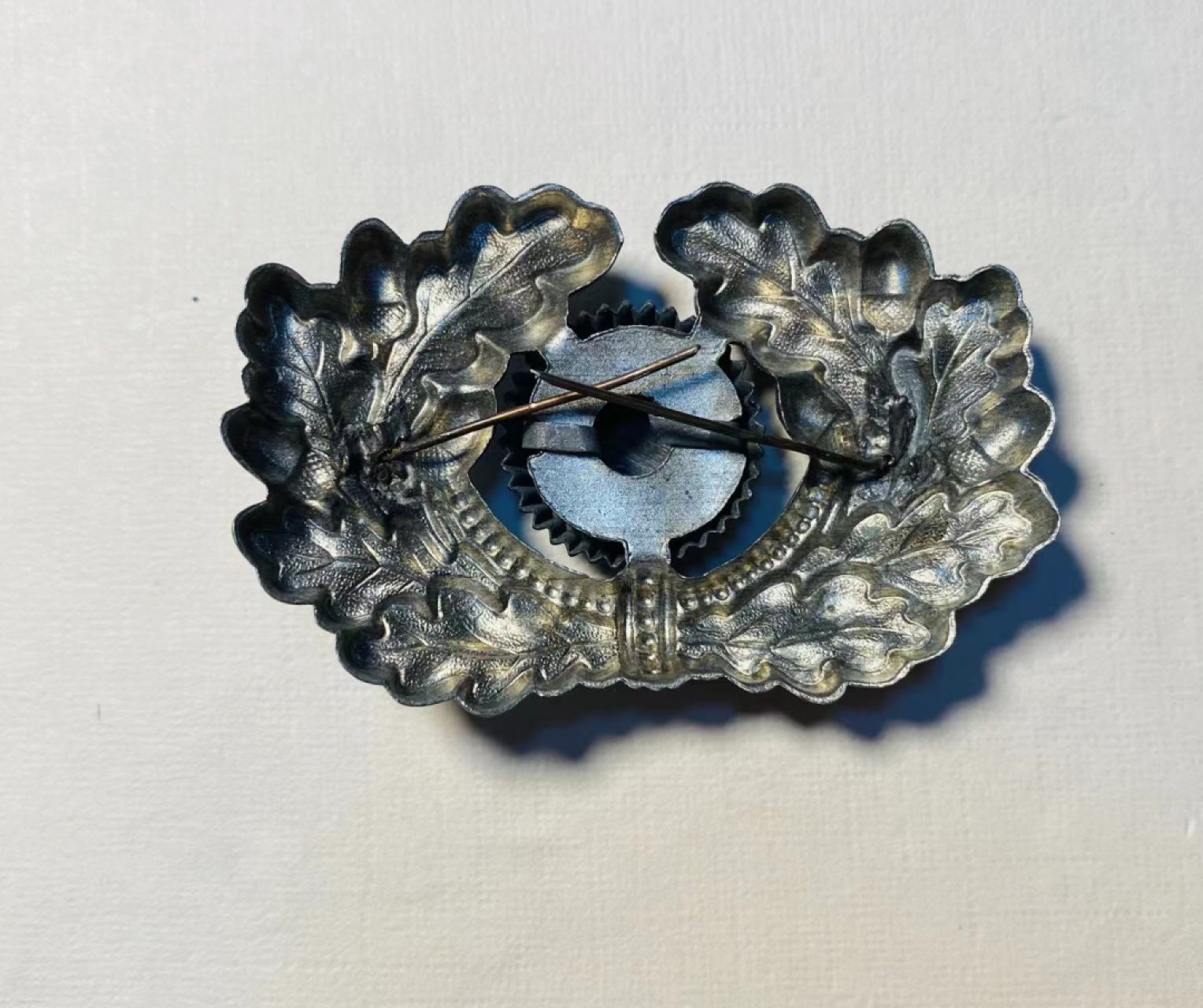 阿娜斯塔西娅军事题材拍卖 二战德国国防军军官帽徽1 好品，插针齐全，锌制