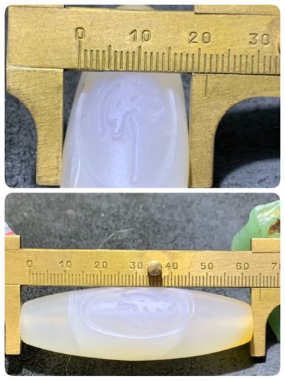 精美高玉化海洋玉髓手工雕刻佛字大桶珠一个 精美高玉化海洋玉髓手工雕刻佛字大桶珠一个