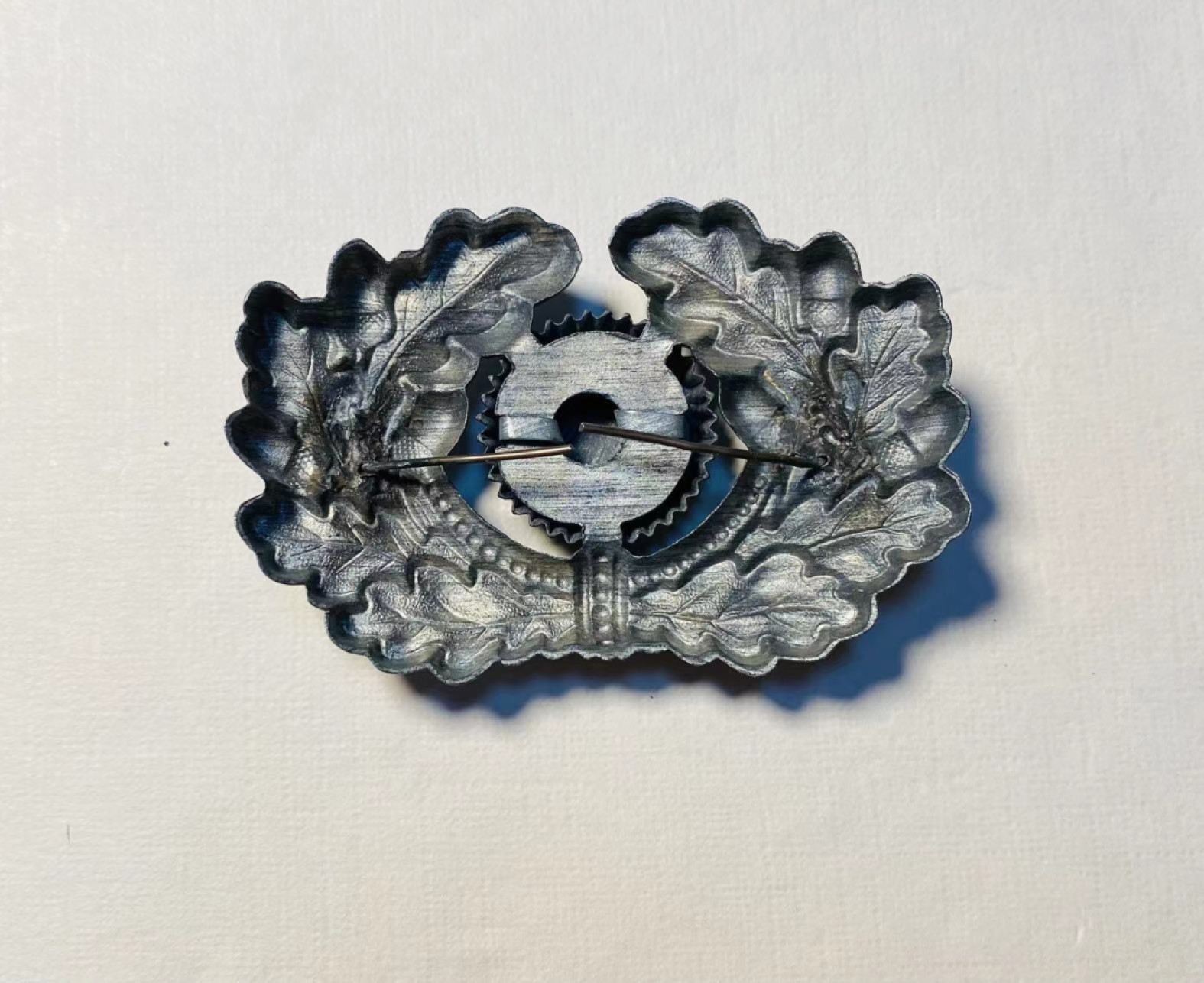 阿娜斯塔西娅军事题材拍卖  二战德国国防军军官帽徽2 好品，插针齐全，锌制