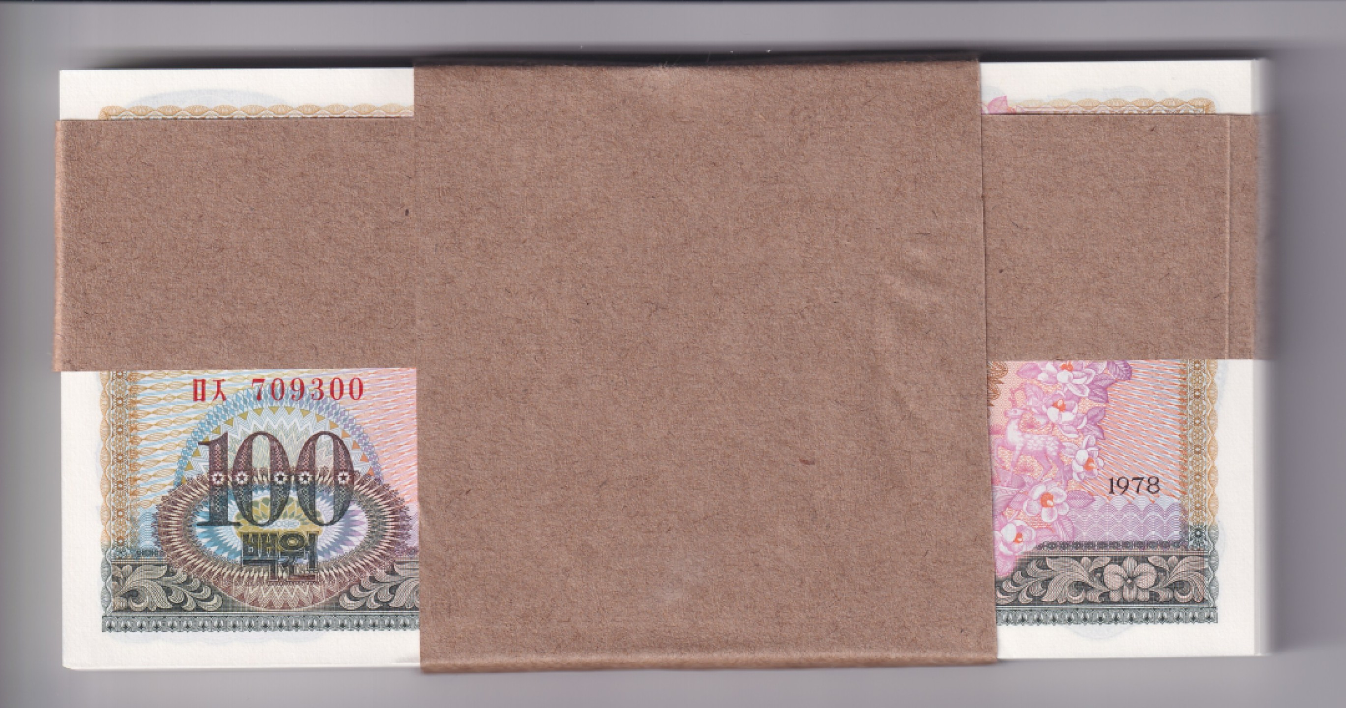 草稿银行第五期国内外钞票拍卖 朝鲜1978年100圆券 原版银行券 原刀100张连号 全新原票