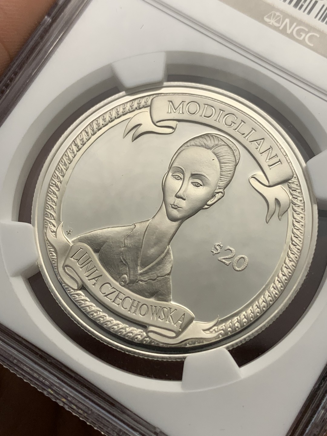 《竞宝斋》第172场-周日，周一2场 (全场包邮) NGC PF69UC 2000年英属维京群岛发行-意大利国宝级画家莫迪利亚尼名画20$纪念银币 唯一冠军分，国内罕见的品种。