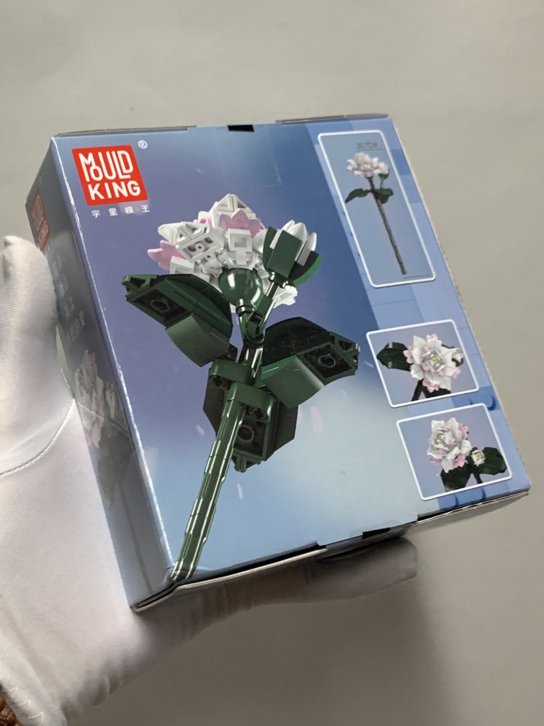 零元拍：花卉系列：山茶花积木拼装模型，高度约20厘米，127粒。全新未拆。