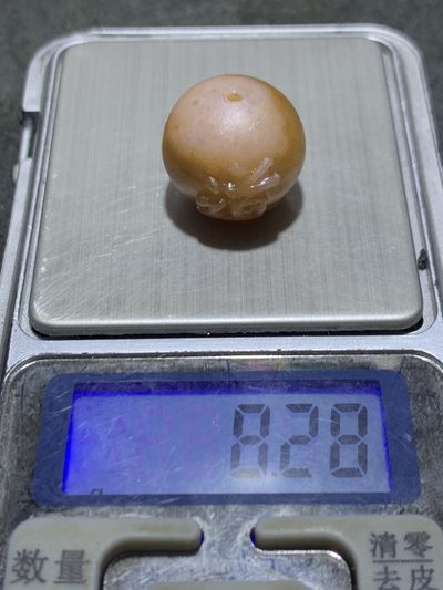 精美战国红玛瑙亚光手工雕刻道字圆珠一颗！ 精美战国红玛瑙亚光手工雕刻道字圆珠一颗！