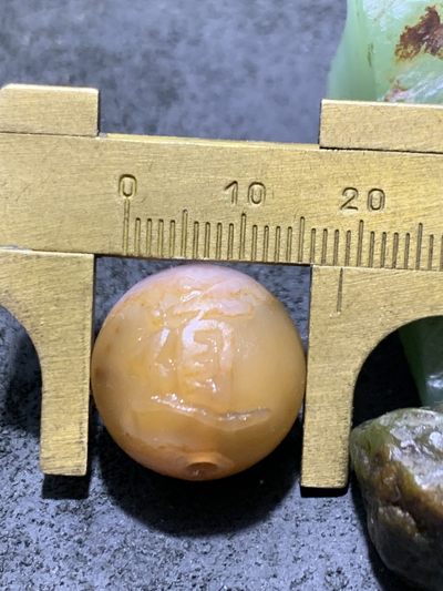 精美战国红玛瑙亚光手工雕刻道字圆珠一颗！ 精美战国红玛瑙亚光手工雕刻道字圆珠一颗！