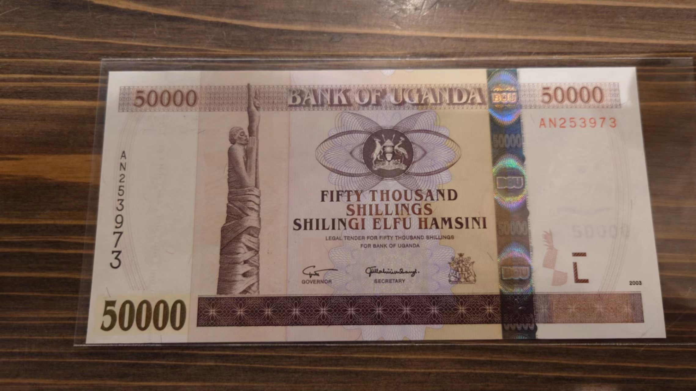 【世界钱币】精选微拍第63期暨2023年第十期 裸钞专场（有最新展会卖剩品种） 2003年乌干达5000 全新绝品