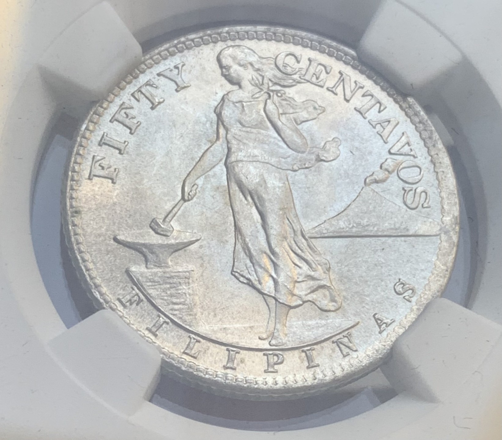 瓶子🏺第95期拍卖会  美属菲律宾1945年50分打铁女神银币  NGC MS63