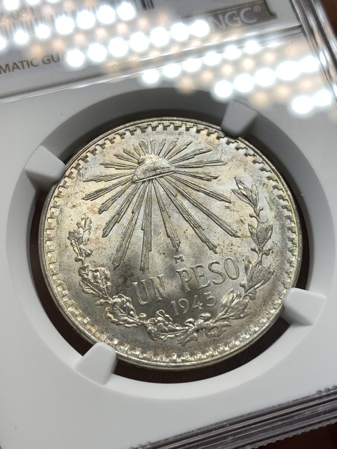 《竞宝斋》第173场-周日，周一2场 (全场包邮) NGC MS66 墨西哥 银币 1945年M版 1比索 原光淡彩