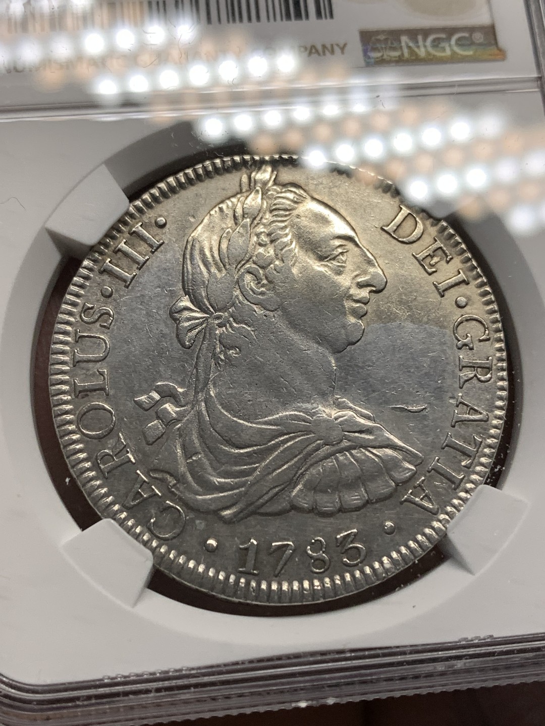 《竞宝斋》第174场-周日，周一2场 (全场包邮) NGC AU 墨西哥1783卡三8R双柱大银币 双面深打 细节很不错