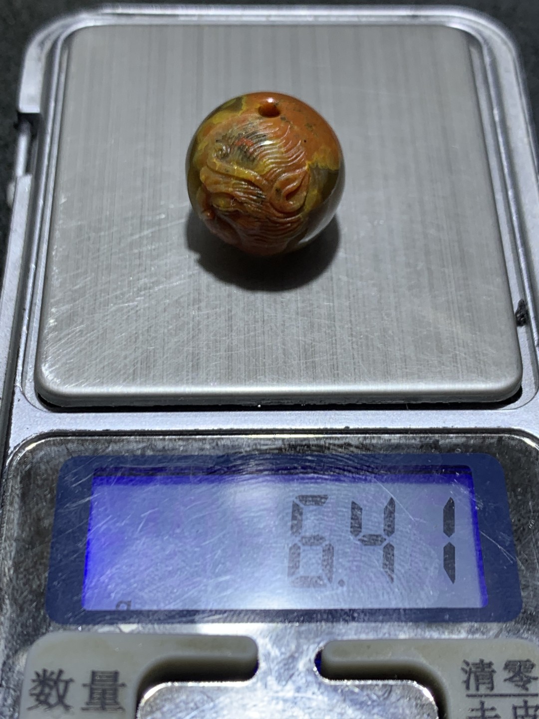 精美冰飘冻料战国红玛瑙手工雕刻齐天大圣圆珠一颗！