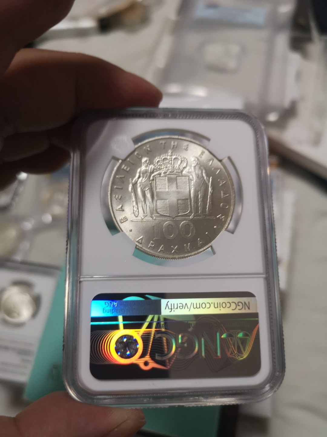 长老汇第4场现代币拍卖 希腊1967鸟中人100德拉克马银币，NGC MS65分高分，50和100德裸币一般品相也要1200元左右