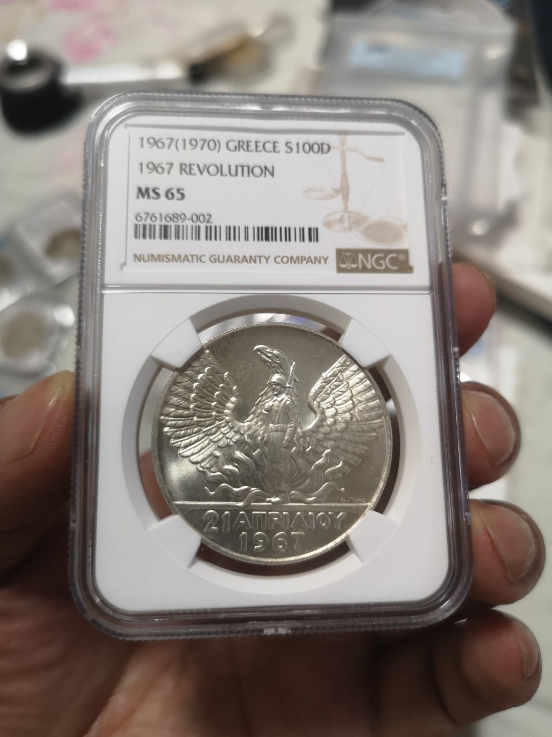 长老汇第4场现代币拍卖 希腊1967鸟中人100德拉克马银币，NGC MS65分高分，50和100德裸币一般品相也要1200元左右