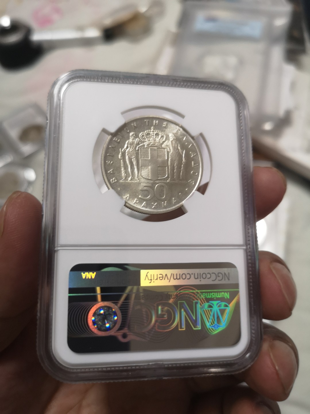 长老汇第4场现代币拍卖 希腊1967鸟中人50德拉克马银币，NGC MS65分高分，50和100德裸币一般品相也要1200元左右