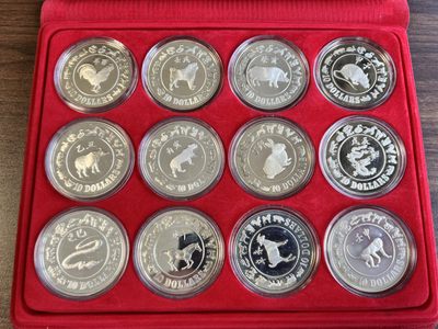 【海寕潮】拍卖第七十二期 - 【海寧潮】新加坡十二生肖纪念银币12枚套带盒证书，有几枚有氧化