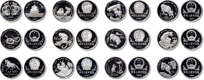 上海匡时2023年春拍中国钱币专场 - 1988年至1999年一盎司白金生肖币一组十二枚，直径：32mm，面额：100元，重量：1盎司，成色：99.9%，精制。白金生肖是中国生肖系列金银币中唯一一套白金材质生肖币，因发行量较少，相对金、银生肖币来说比较珍惜。此套白金币均NGC评级69分ULTRA CAMEO，是惜珍中的金贵，生肖币中的大珍。<br>1988年龙年1盎司白金币一枚，发行量：2000枚。正面：北京天坛祈年殿。背面：双龙戏珠。
