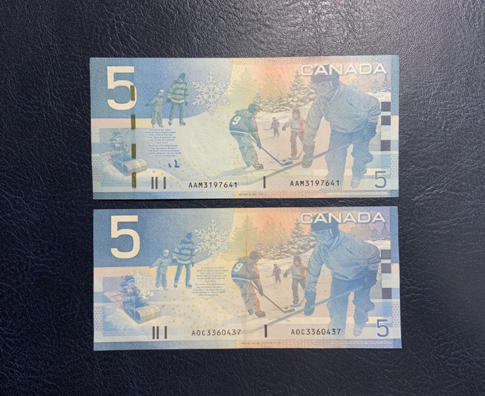 收藏联盟Quantum Auction 第267期拍卖  加拿大2009年和2001年5元 品相分别为UNC和XF 其中一个为AA首发组 经典旅版