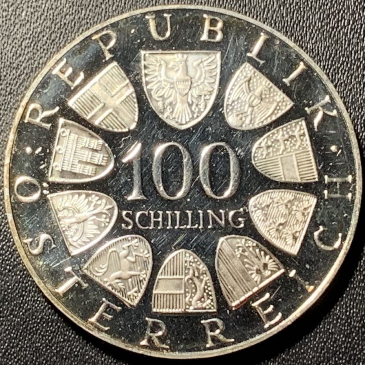 紫瑗钱币——第324期拍卖 奥地利 1976年 因斯布鲁克冬奥运 主会场 100先令 24克 0.64银 精制