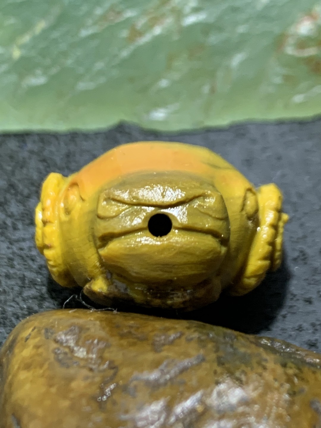 精美亚光战国红玛瑙手工俏色巧雕如意牛头一体佛头三通一个