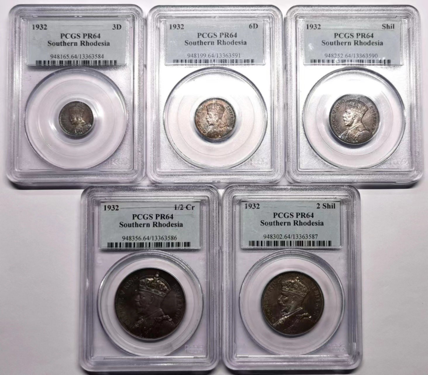 凡希社世界钱币微拍第二百四十二期 荐！1932英属南罗得西亚乔五精铸PS五枚套PCGS-PF64均匀紫罗兰彩见细节图！