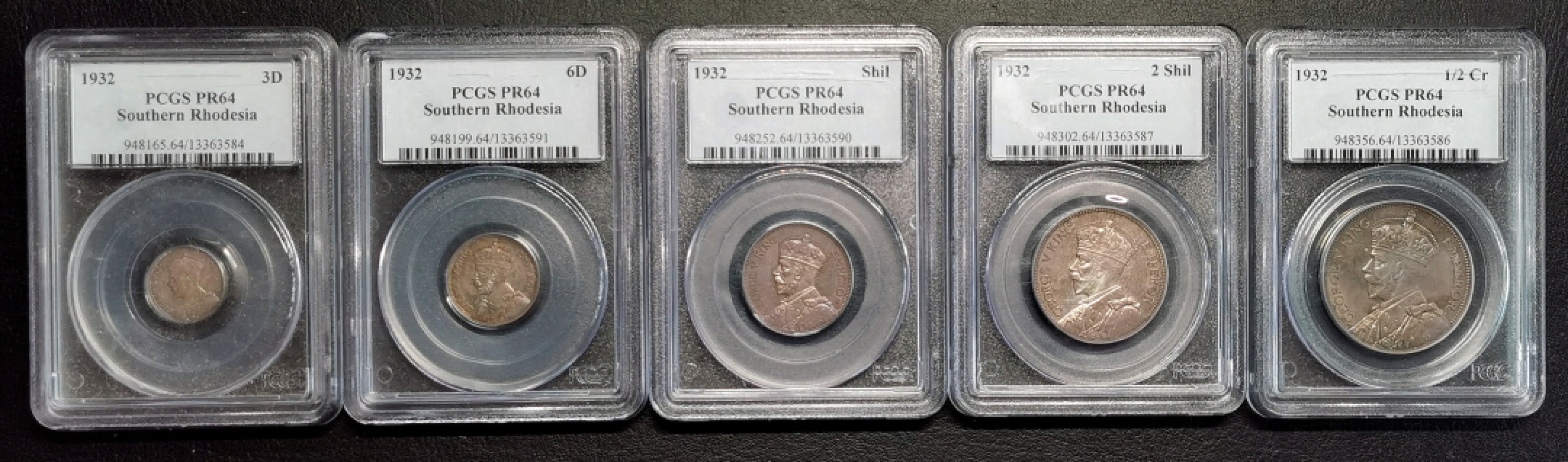 凡希社世界钱币微拍第二百四十二期 荐！1932英属南罗得西亚乔五精铸PS五枚套PCGS-PF64均匀紫罗兰彩见细节图！