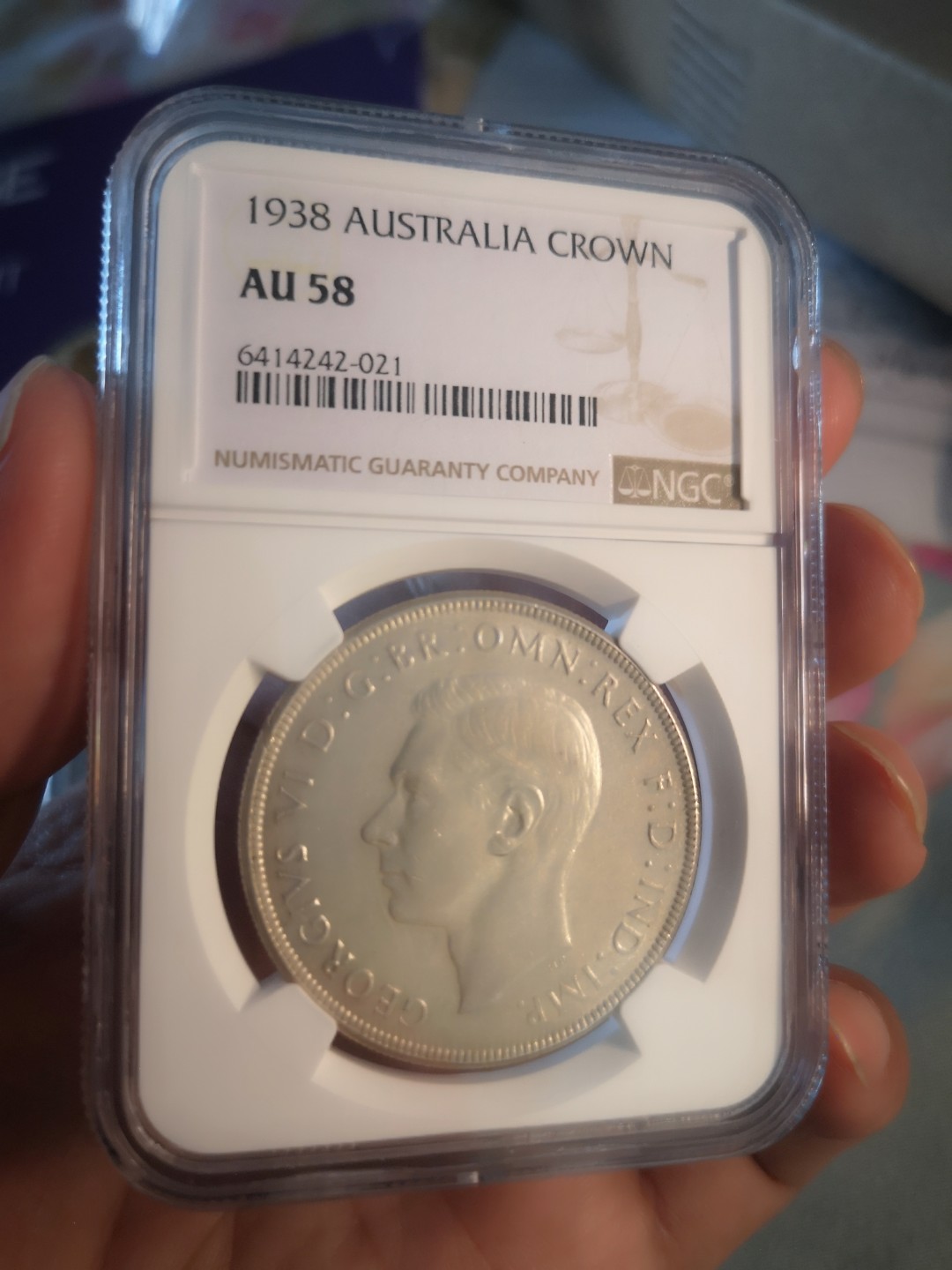 长老汇第6场老银币拍卖 澳大利亚1938乔治六世1克朗大银币，NGC AU58，38年比37年发行量少了很多，克书38年XF40标价175美金