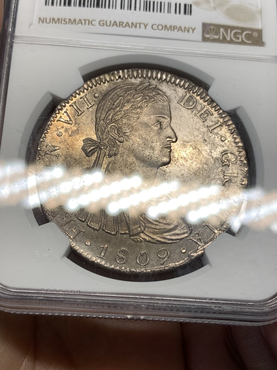 《竞宝斋》第175场-周日，周一2场 (全场包邮) NGC UNC 墨西哥 1809 费七 戎装版 臆造头像 8R 双柱大银币 双面深打 光度好