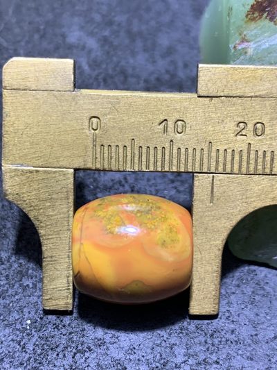 精美黄金草花纹战国红玛瑙桶珠一颗 精美黄金草花纹战国红玛瑙桶珠一颗