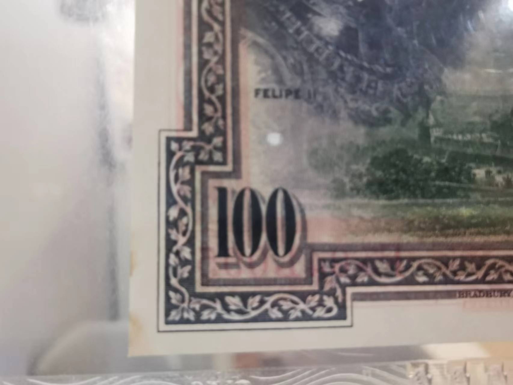 243.【鲸贝乐淘★两拍包邮】三字经·第“首孝悌，次见闻”号拍卖 【西班牙🇪🇸】1925年100元，百年老钞，PMG64分，瑕疵如图