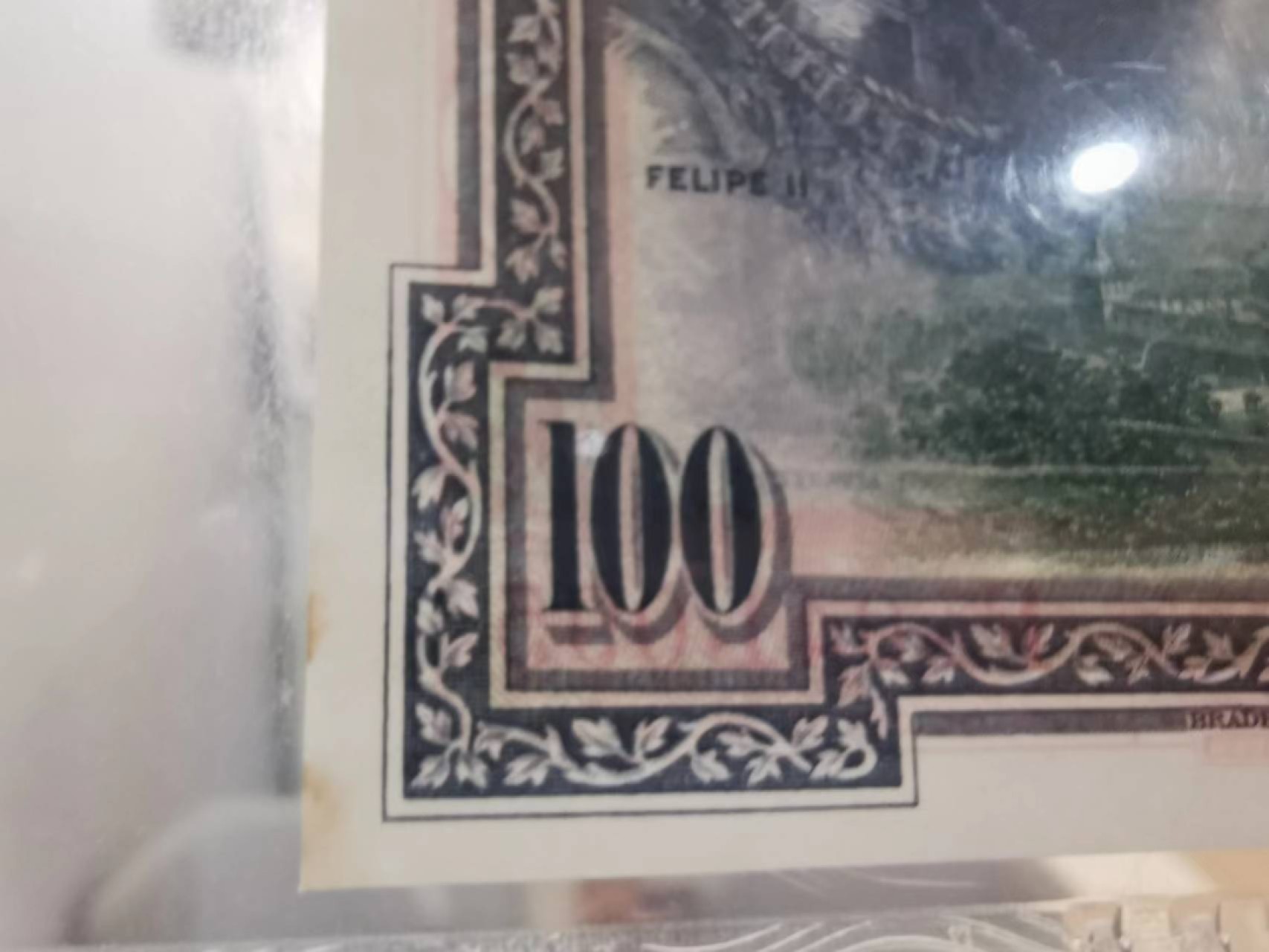 243.【鲸贝乐淘★两拍包邮】三字经·第“首孝悌，次见闻”号拍卖 【西班牙🇪🇸】1925年100元，百年老钞，PMG64分，瑕疵如图