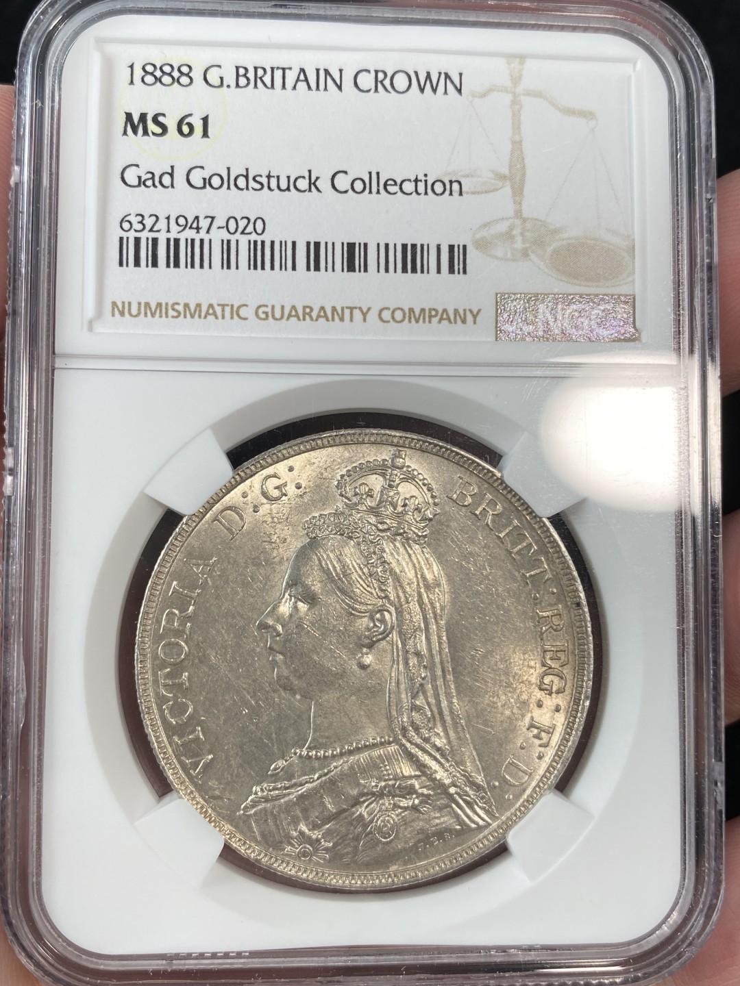 万国钱币拍卖第011期（视频直播专场） NGC MS61 1888英国维多利亚高冠马剑1克朗，好品有难度的年份，名家旧藏。