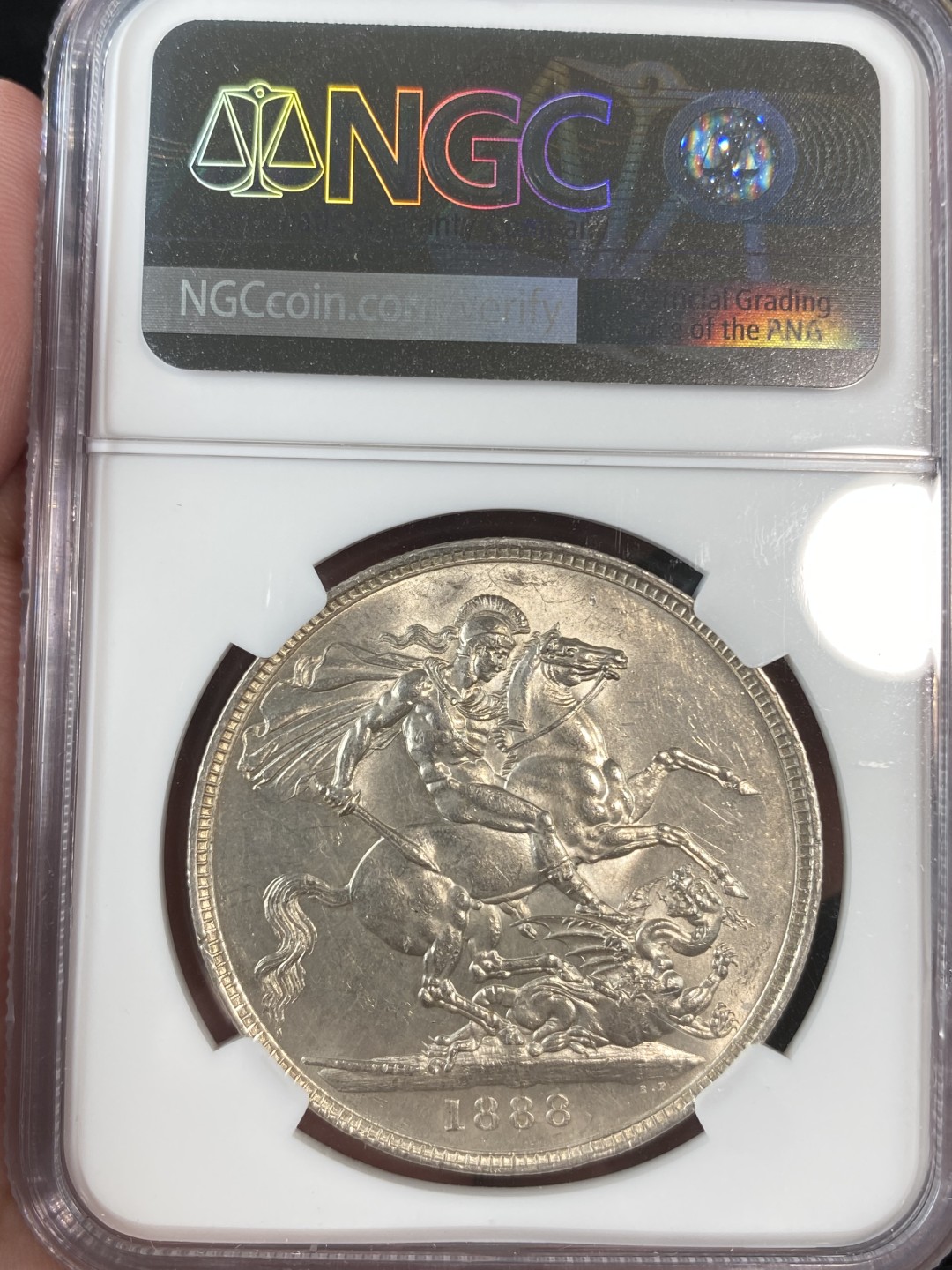 万国钱币拍卖第011期（视频直播专场） NGC MS61 1888英国维多利亚高冠马剑1克朗，好品有难度的年份，名家旧藏。