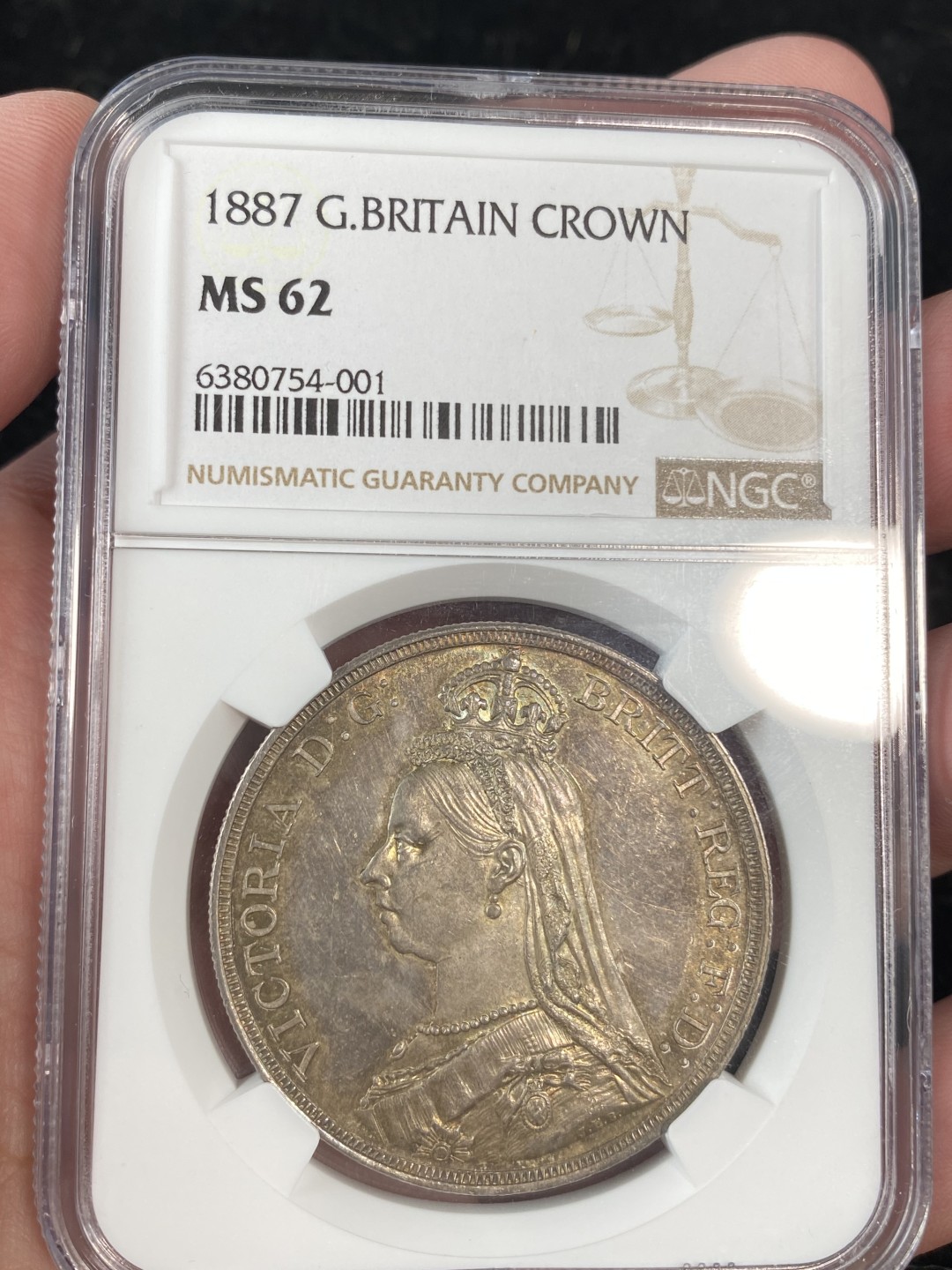 万国钱币拍卖第011期（视频直播专场） NGC MS62 1887英国维多利亚女王高冠马剑1克朗，深五彩包浆。