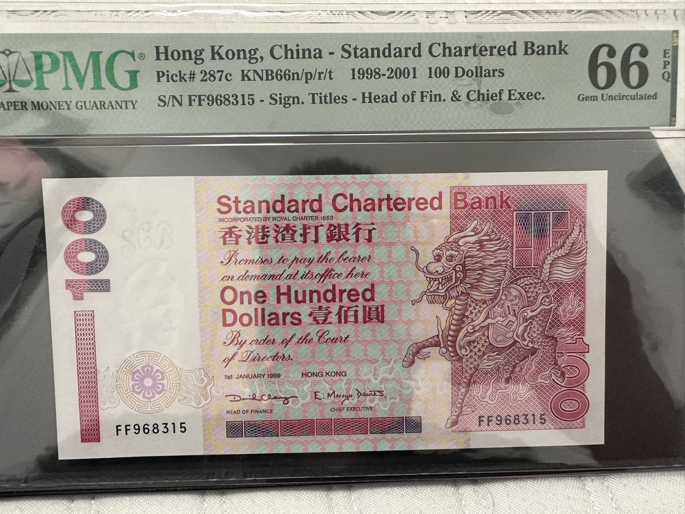 《外钞收藏家》第二百八十一期（连拍第一场） 1999年香港渣打银行100元 PMG66 无47